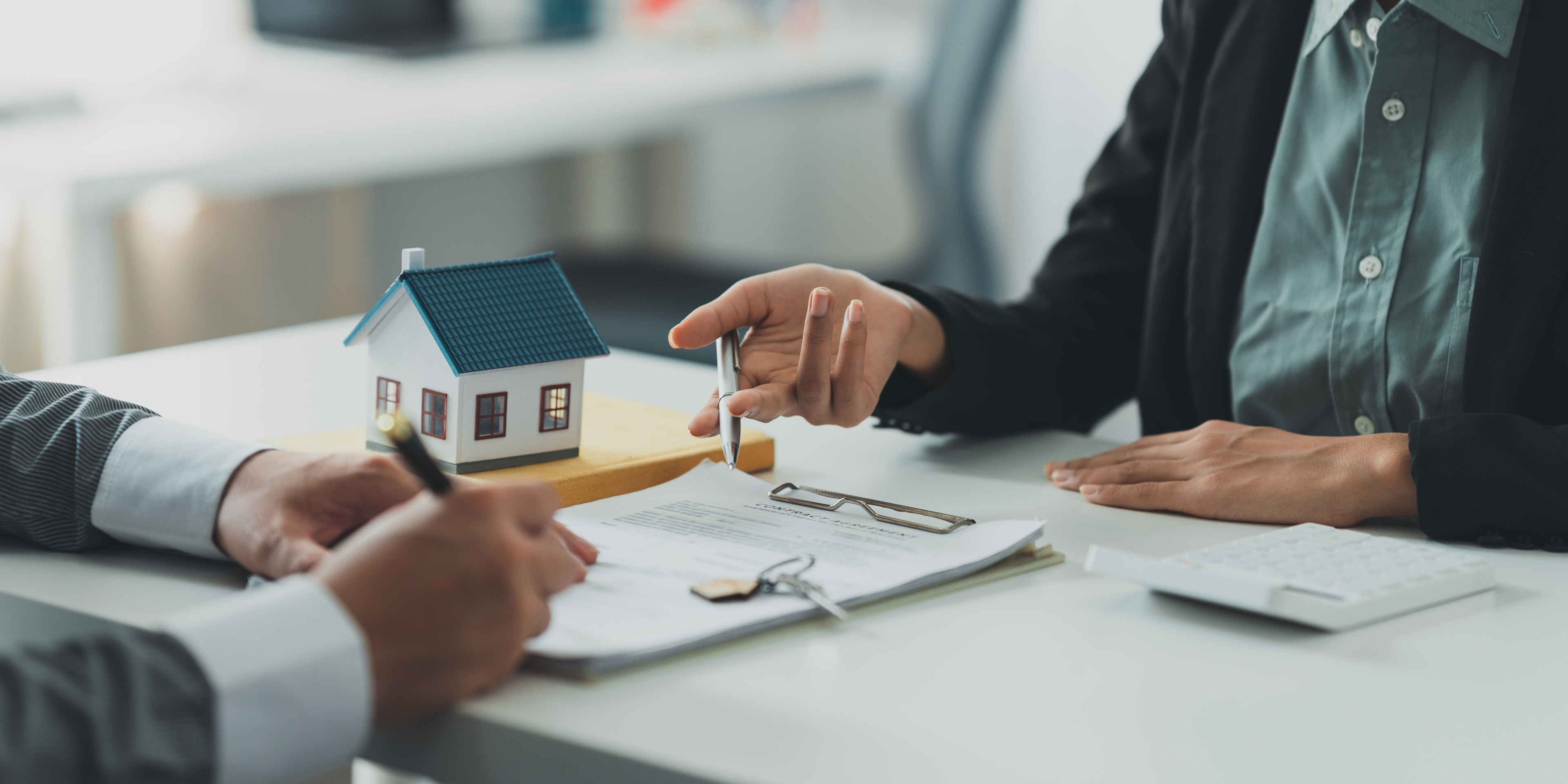 Close Up Business Woman Or Real Estate Agent Explain Signing Agreement For Buying House. Bank Manager And Real Estate Concept.